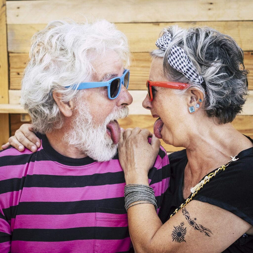 Portrait of cheerful caucasian senior crazy couple