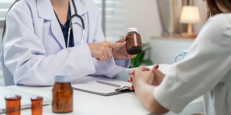 Doctor Consulting Patient on Medication Management for Effective Treatment